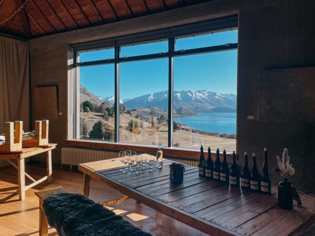 Inside the Rippon cellar door, looking out over Lake Wanaka